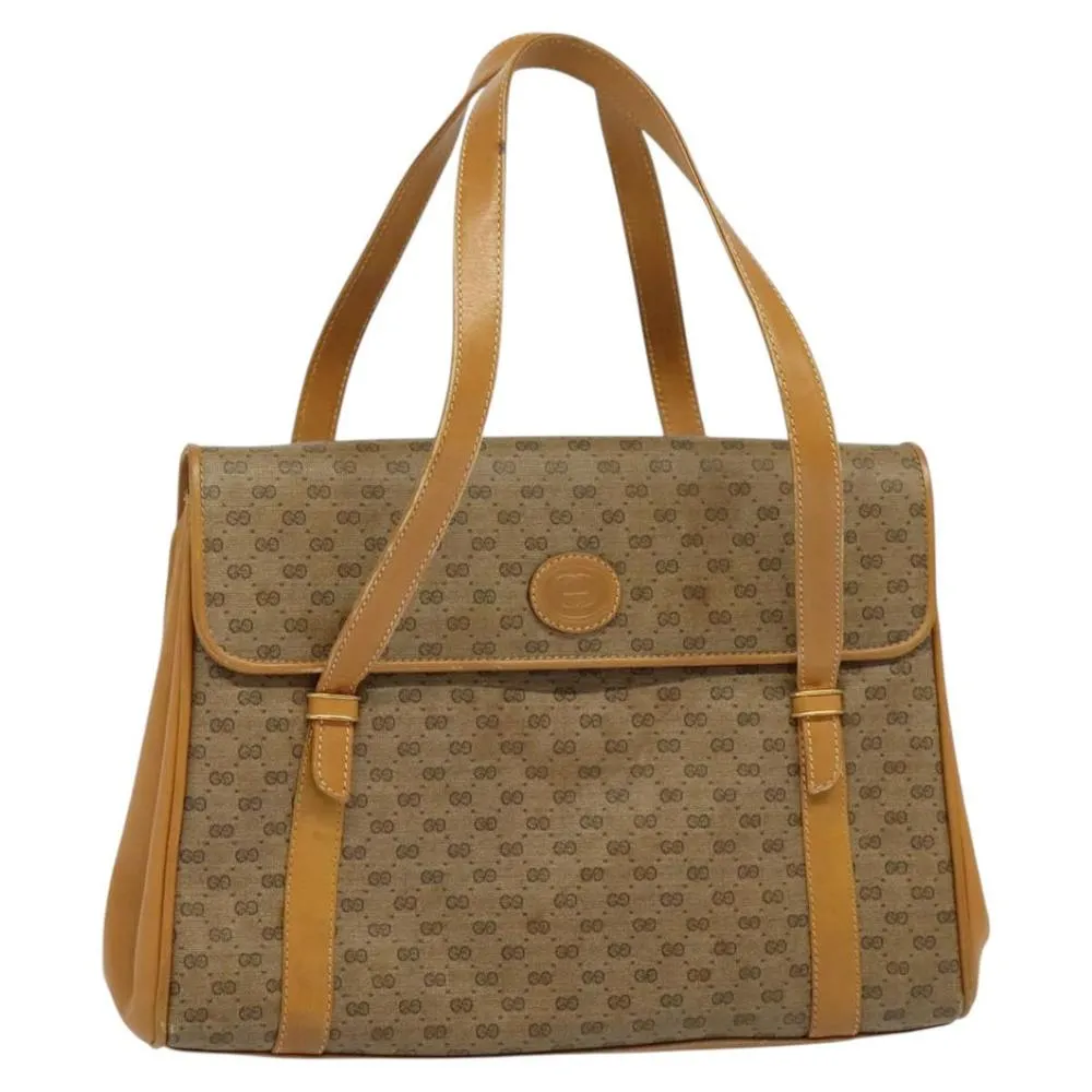 Preloved Elegant Top Handle Bag with Unique Pattern and Flap Closure